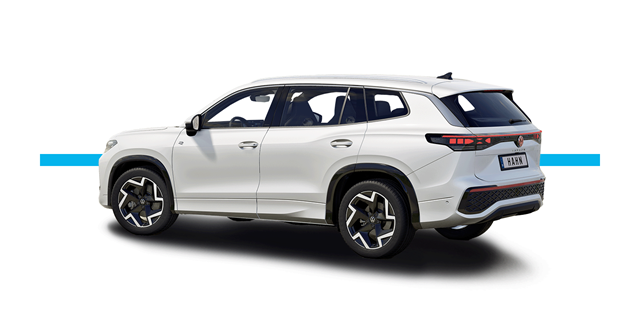 VW Tayron R-Line in weiß in der Seitenansicht vor einem weißen Hintergrund 